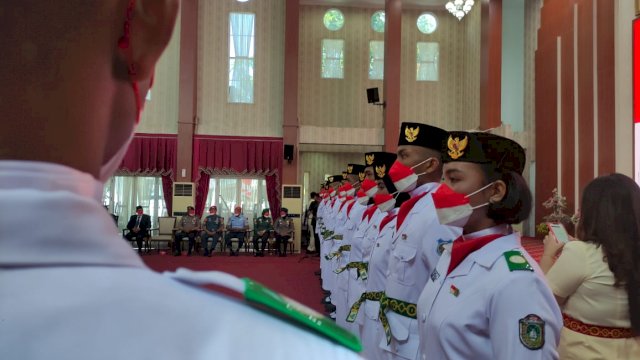 Proses pengukuhan paskibraka Sulsel. Foto: portalmedia/Al Fath