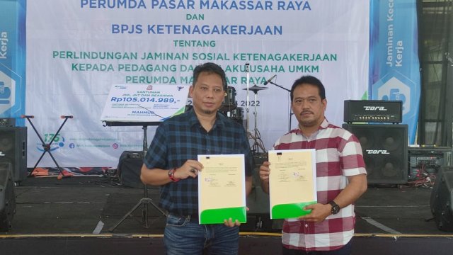 Penandatangan kerja sama antara Perumda Pasar Makassar Raya dan BPJS Ketenagakerjaan. Foto: portalmedia/Gita