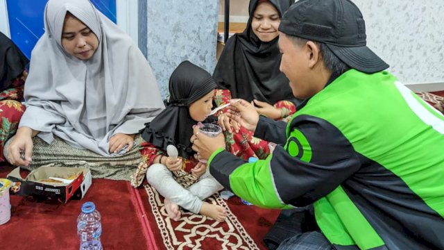 Ratusan Driver Gojek Gelar Aksi Sosial ke Puluhan Panti di Makassar