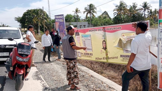 DIRUSAK. sejumlah alat peraga kampanyen (APK) Muhammad Fauzi diduga dirusak oleh oknum tak bertanggung jawab pada pekan lalu.