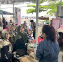 Erna Rasyid Taufan Berbagi Al-Qur'an dan Takjil Gratis