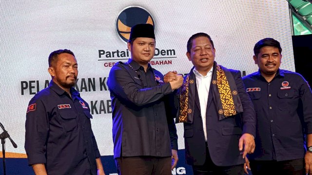 Arham Basmin bersama Ketua DPW Partai NasDem Rusdi Masse.